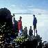 standing on a cliff in winter